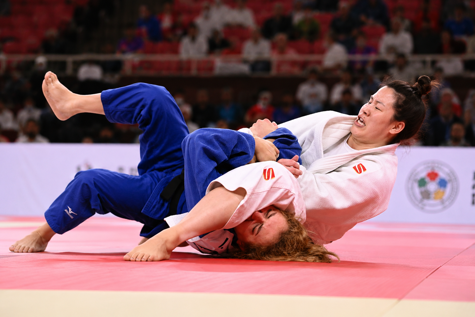 Girls and boys doing Judo 